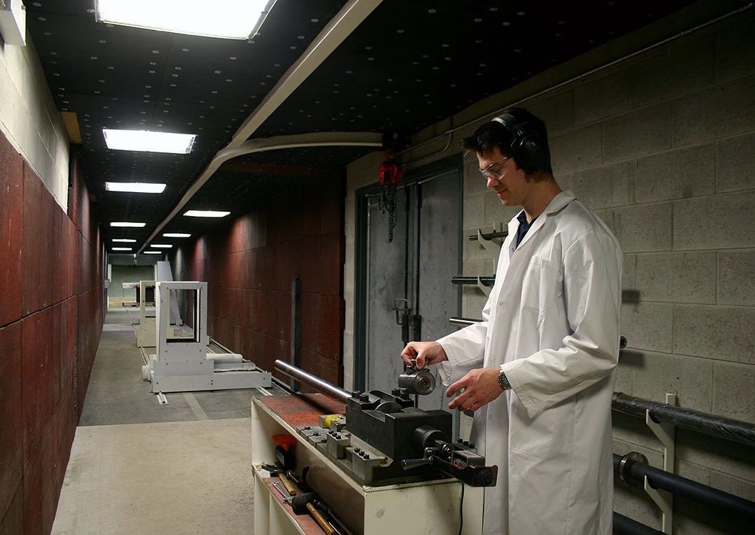 Technician working at DEW’s ballistic testing facility