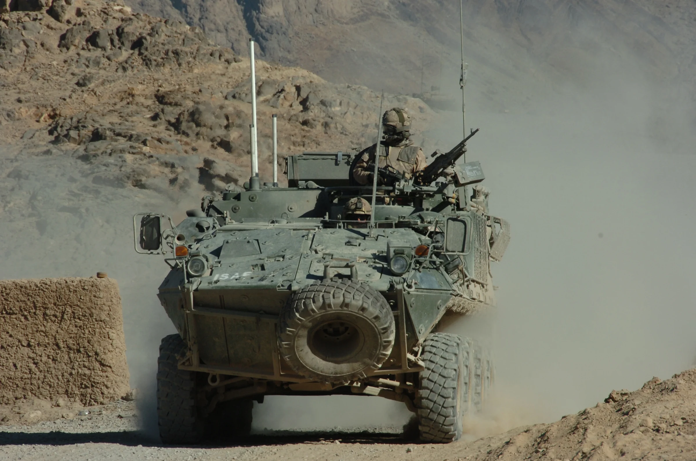 Bison vehicle on a mountain road in Afghanistan