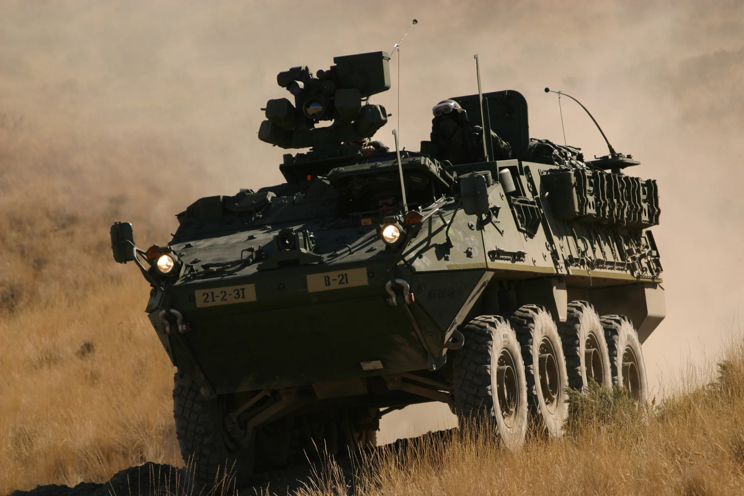 Stryker armoured vehicle crossing open terrain